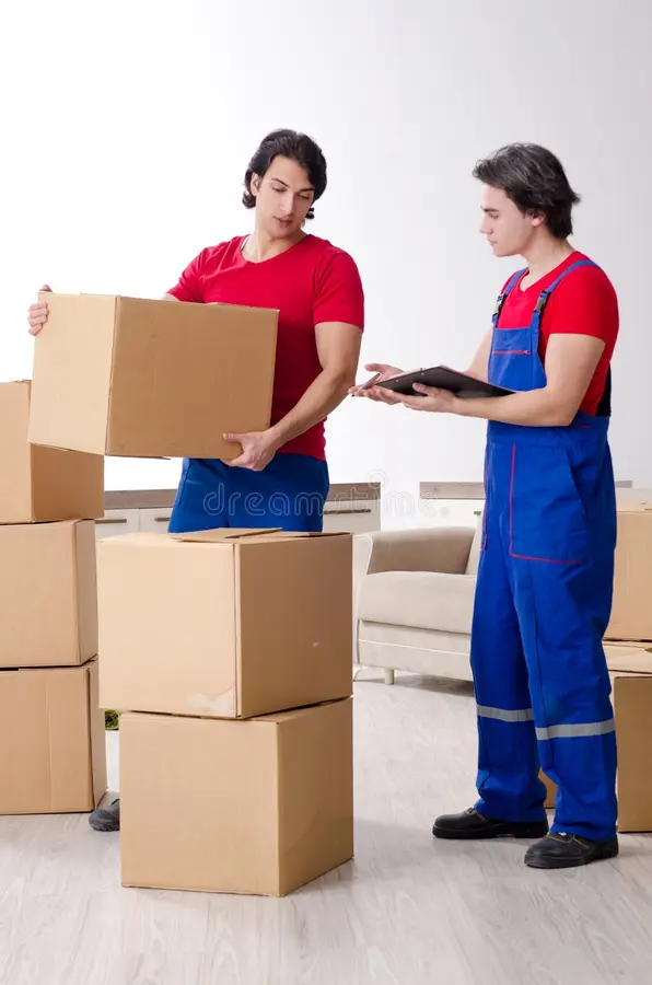 two young contractor employees moving personal belongings two young contractor employees moving personal belongings 159298279